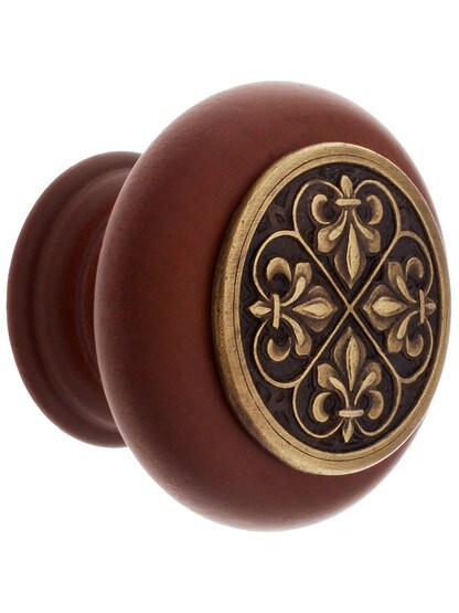 1 1/2 inch Diameter Fleur Dis Lis Knob in Cherry/Antique Brass.